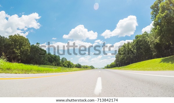 POV point of view - Driving East\
on Interstate Highway 40 on cross-country road\
trip.