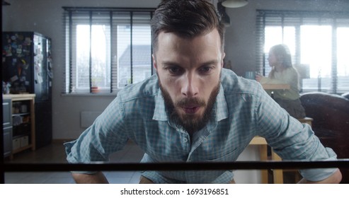 POV Shot, Young Handsome Caucasian Man Taking Hot Fresh Cupcakes Out Of Oven. Cooking At Home With Family Slow Motion.