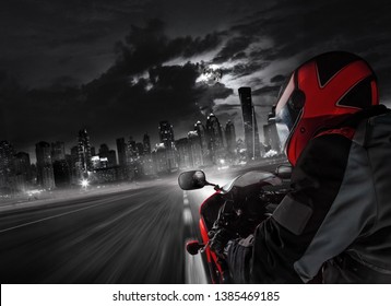 POV Of Super Sport Motorcycle Driver Riding Towards Big City. Outdoor Photography. Travel And Sport, Speed And Freedom Concept