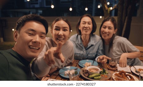 POV webcam screen group facetime videocall look at camera greeting smile laugh fun joy talk online at dine table night party at home. Enjoy mobile phone selfie app with young senior middle aged mom. - Powered by Shutterstock