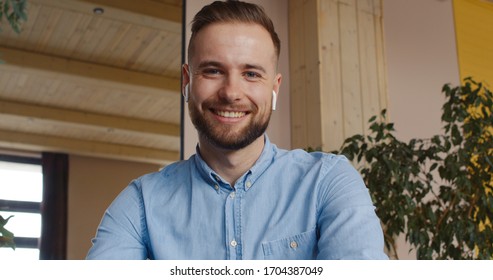 POV WEBCAM VIEW Caucasian male having a video work call with colleagues. Remote work, kitchen background. Quarantine working, stay home, coronavirus pandemic - Shutterstock ID 1704387049