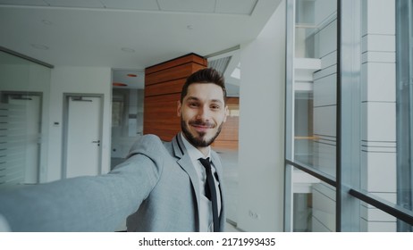 POV Of Young Businessman In Suit Taking A Selfie Photo And Have Fun In Modern Office Indoors