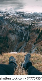 POV Young Caucasian Male Hiker Enjoys View Of A Mountain Waterfall In French Alps