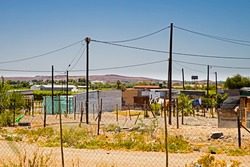 Poverty Stricken Settlement With Homes Made From Corrugated Sheeting In Northern Cape, South Africa