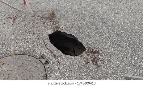 Povoa De Varzim, Portugal - May 28 2020: Sinkhole Appeared In Middle Of The Road. Close Up.
