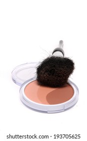 Powder Bronzer In Three Shades Of Tan In A Compact Case With Soft Brush On A White Background