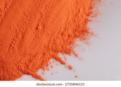Powder paint represents a dynamic material used across creative, decorative, and surface-focused projects. The intense orange pigment shown in the image delivers a strong visual presence, expressing energy, warmth, and clarity. Its dry and finely ground structure allows precise handling while maintaining a clean and modern appearance.

This material is often selected for artistic production, coating processes, and design applications where bold color impact is required. The textured layer visible here highlights depth and richness, while the contrast against a light background enhances visual balance. Such pigments are valued for their ability to deliver consistent tone and controlled coverage.

Creative professionals appreciate this form for its adaptability and storage efficiency. It can be applied, blended, or processed in multiple ways depending on project needs. The granulated composition suggests quality preparation and reliable performance across various uses.

Overall, the image communicates creativity, strength, and material precision. The vivid hue draws attention without overwhelming the composition, making it suitable for modern visual concepts. Powder paint remains a practical option for designers and artists seeking expressive color combined with functional simplicity.