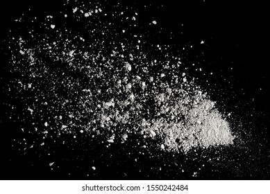 Powder white cement rock stone broken splash isolated on black background - Shutterstock ID 1550242484