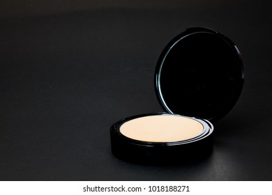 Powder  for Women To make her look beautiful at work on a black background.