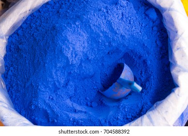 powdered pigments in sacks for sale in blue town chefchaouen, morocco