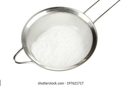 Powdered Sugar In Metal Sieve Isolated On White