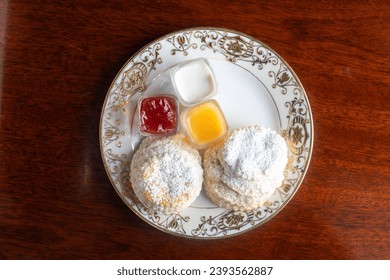 Powdered Sugar Scones with Jam  - Powered by Shutterstock