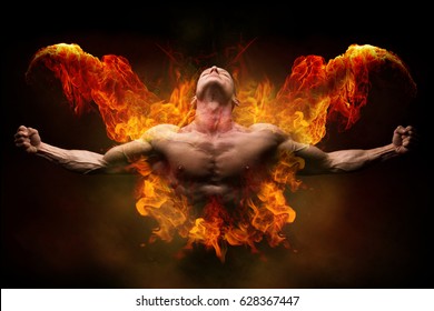Power athletic man with great physique. Strong bodybuilder with open arms and surrounded by fire
