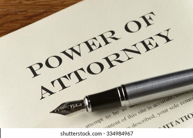 power of attorney document with silver fountain pen - Shutterstock ID 334984967