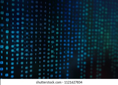 power of big data. binary code information bit on computer monitor screen display. blue light text number one and zero. blur defocus blue bokeh light. technology graphic design background concepts