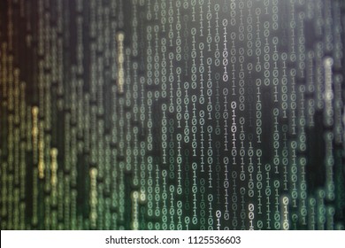 power of big data. binary code information bit on computer monitor screen display. green light text number one and zero. blur focused blue bokeh light. technology graphic design background concepts - Powered by Shutterstock - Get 15% off with code: PIKWIZARD15