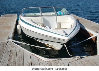 Power Boat At A Dock; Lake Arrowhead, California