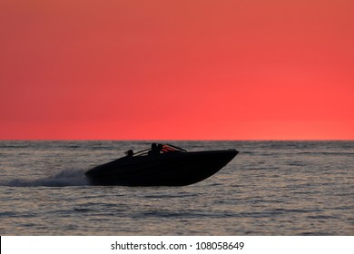 Power Boat On Lake Huron At Sunset - Ontario, Canada	