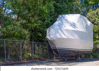 Power Boat On Stands Wrapped In White Shrink Wrap