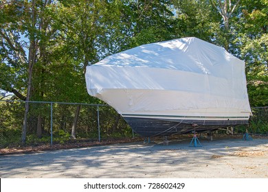 Power Boat Yacht Covered With White Shrink Wrap