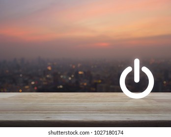 Power Button Icon Over Blur Of Cityscape On Warm Light Sundown, Start Up Business Concept