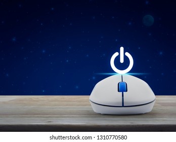 Power button with wireless computer mouse on wooden table over fantasy night sky and moon, Start up business concept