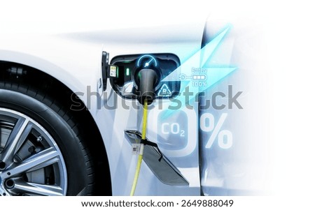 Power cable pump plug in charging power to electric vehicle EV car.