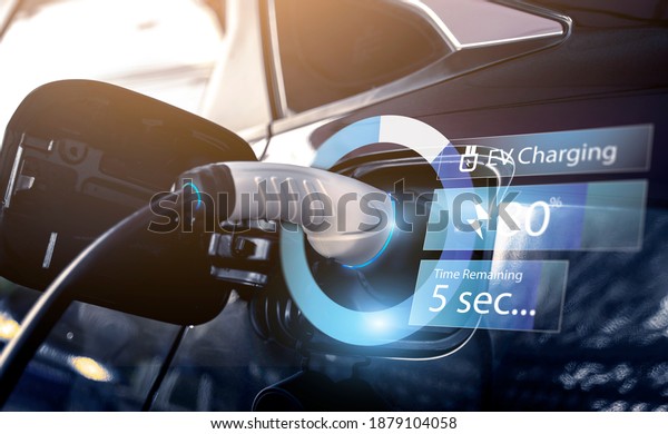 Power cable pump plug in charging power to\
electric vehicle EV car with modern technology UI control\
information display, car fueling station connected power cable\
alternative sustainable eco\
energy