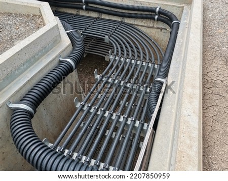 Power cables and instrument cables in cable trench for substa. High voltage electricity Cables Installation Trenches Electrical new high voltage power lines cable trench been installed in underground.