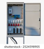 Power distribution cabinet. Outdoor electrical distribution cabinet with automatic three-phase circuit breakers. Power supply cable from the grid entering the fuse box. isolated, white background.