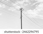 Power electric pole with line wire on dark background close up, photography consisting of power electric pole with line wire under sky, line wire in power electric pole for residential buildings