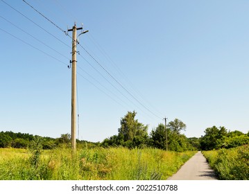 Power electric pole with line wire on colored background close up. Photography consisting of power electric pole with line wire under sky. Line wire in power electric pole for residential buildings. - Shutterstock ID 2022510788