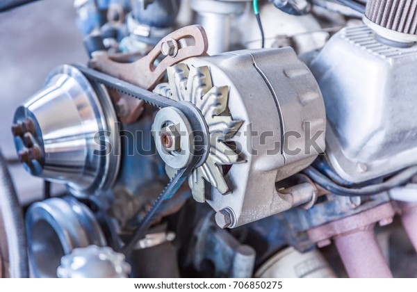 The power engine machine of a car.\
Internal antique engine motor. Vintage\
background.