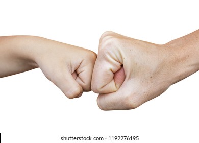 Power Five, Fist Bump Or Brofist. Close-up Of Child And Adult Fists Touching Each Other