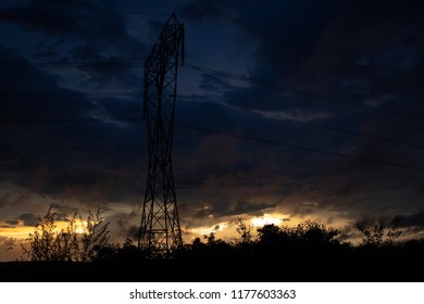 Power Line In A Stormy Sunset