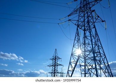 Power Line Support With Wires For Electricity Transmission. High Voltage Grid Tower With Wire Cable At Distribution Station. Energy Industry, Energy Saving