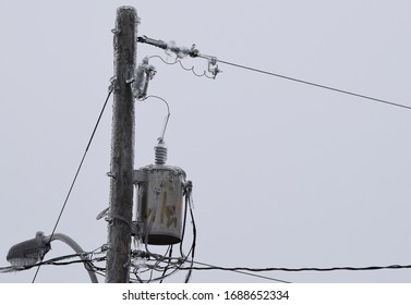 Power Line Transformer Covered In Ice, Closeup 