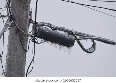 Power Line Transformer Covered In Ice, Closeup 