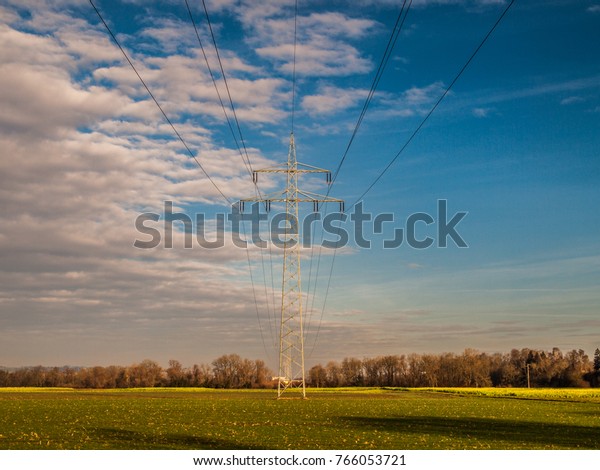 power lines over a flat\
landscape