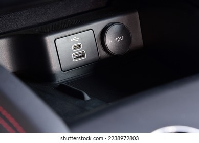 Power outlet and USB port in car