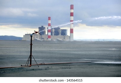 Power Plant Ash Dump Sprayed With Water