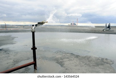 Power Plant Ash Dump Sprayed With Water