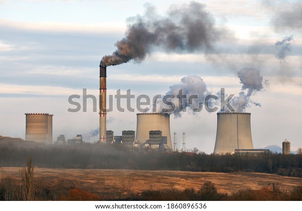 Power plant emiting dark thick\
smoke and steam. Matrai eromu, Mátrai Erőmű, Visonta,\
Hungary