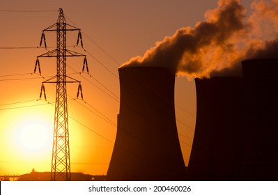 power plant at sunset