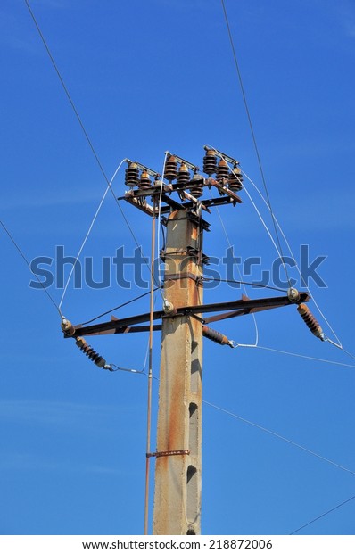 Power pole\
with external electric separator on top\
