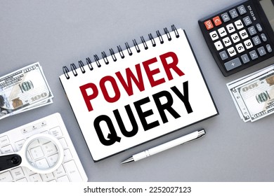 Power Query . top view of the text near the calculator. - Shutterstock ID 2252027123