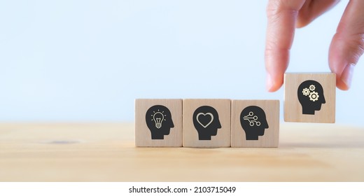 Power skills concept. Need of skills for digital and technology evolution. Soft skill,thinking skill, digital skill. Hand holds wooden cubes with "power skills" icon on white background, copy space.