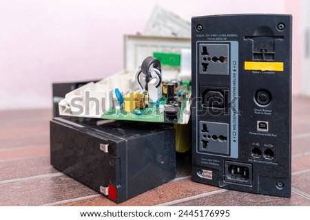 Power socket on the back of UPS, power backup battery for personal computers. Electronic waste.