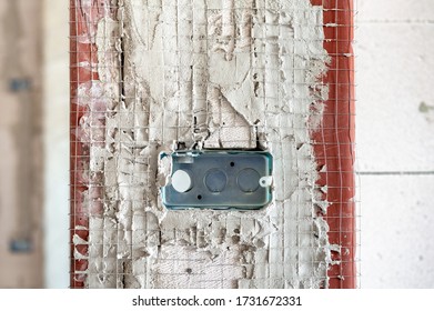 Power steel boxes and electrical metal conduit for cable or network wiring installation embed in plaster loft brick wall background for industry technology underground work isolated with clipping path