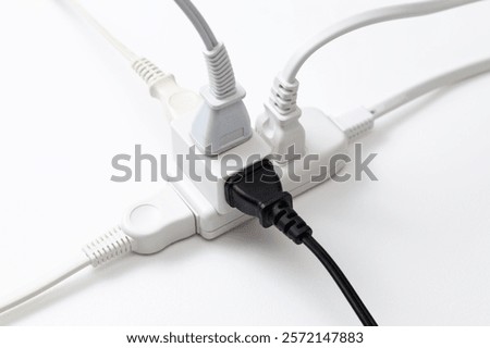 A power strip with multiple electrical outlets.